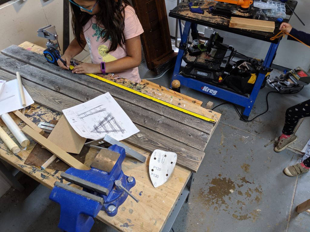 Measuring the shelves for the DIY wooden ladder bookcase