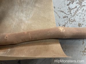 Sanding a wooden wand